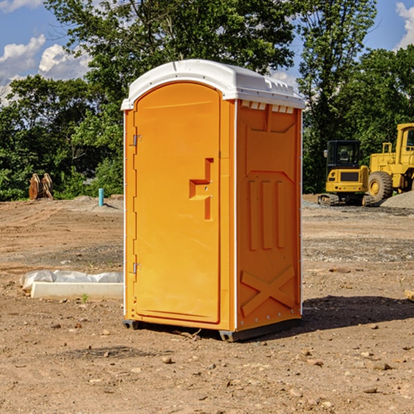 how often are the porta potties cleaned and serviced during a rental period in Reasnor